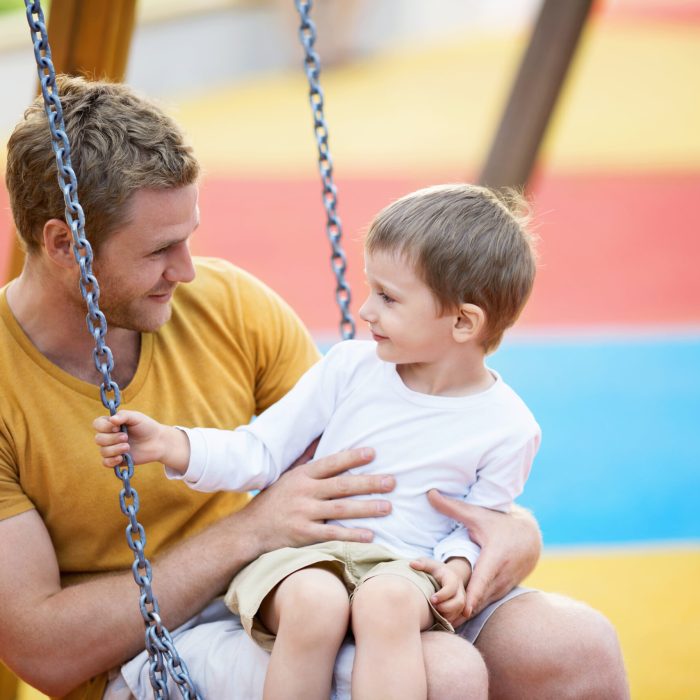 Dad and son on the playground